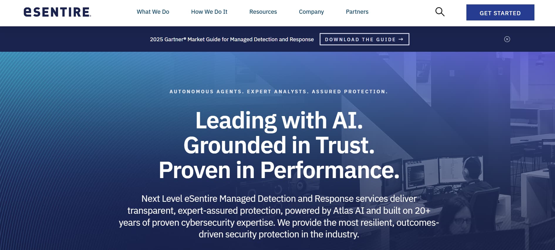 eSentire homepage – “Managed detection and response homepage with headline ‘Leading with AI. Grounded in Trust.’”