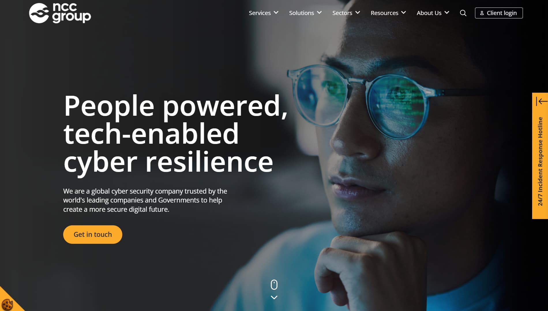 Website banner for NCC Group showing a close-up of a person with code reflected in their glasses. Text reads ‘People powered, tech-enabled cyber resilience’ emphasizing global cybersecurity expertise