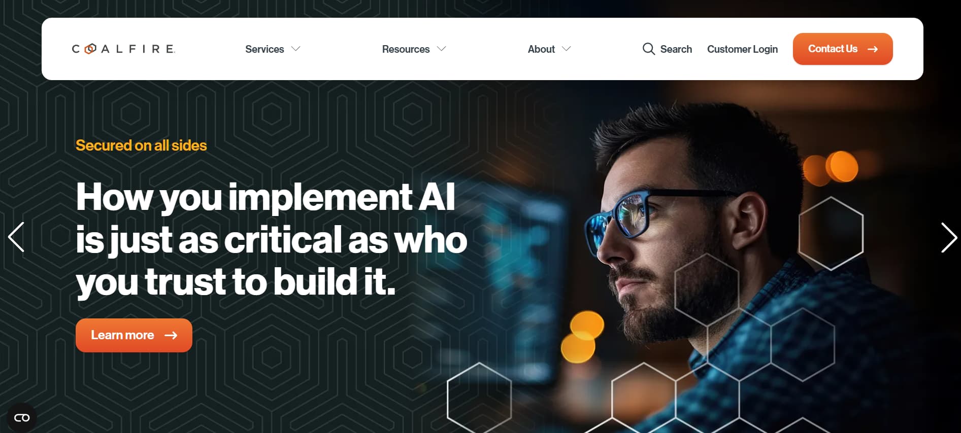 Website hero showing a professional working at a computer with headline stating that how AI is implemented is as critical as who builds it, emphasizing secure AI adoption.