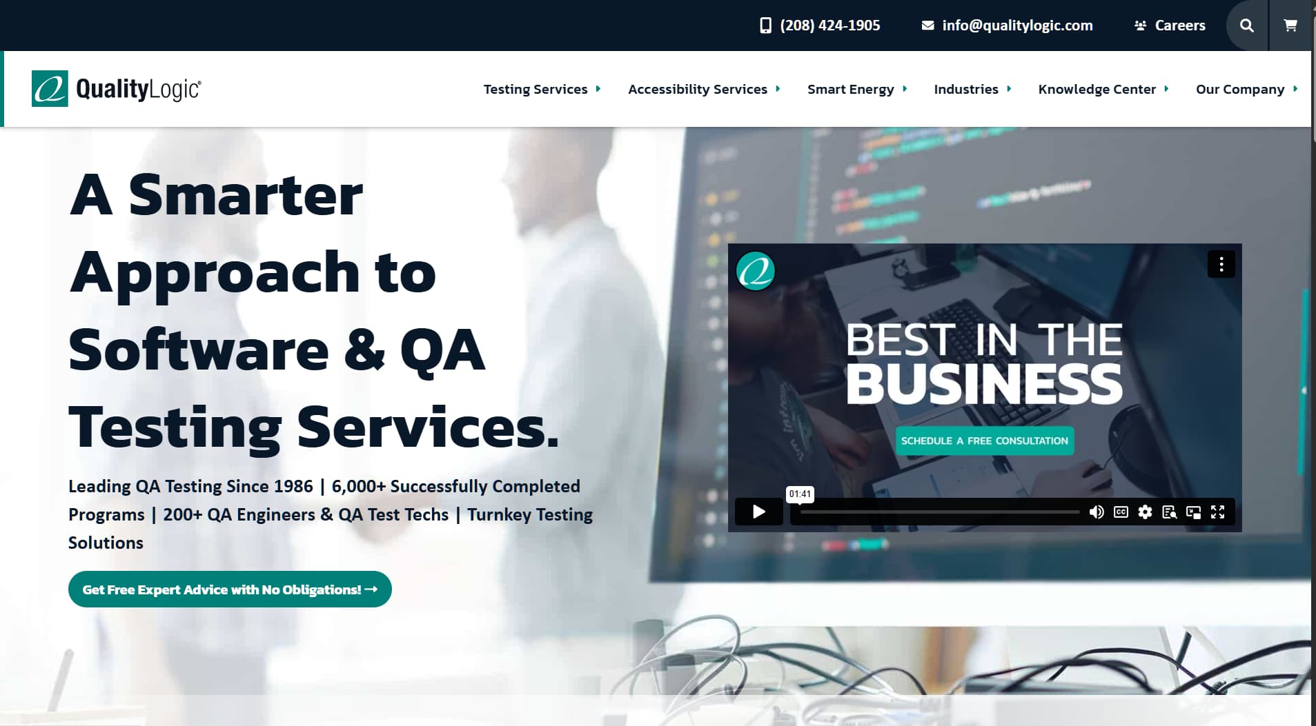 Homepage of QualityLogic showing a modern office scene and text promoting software and QA testing services with decades of experience