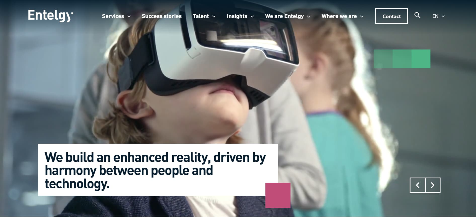 Entelgy technology company website hero showing child using virtual reality headset representing digital innovation and people-technology harmony