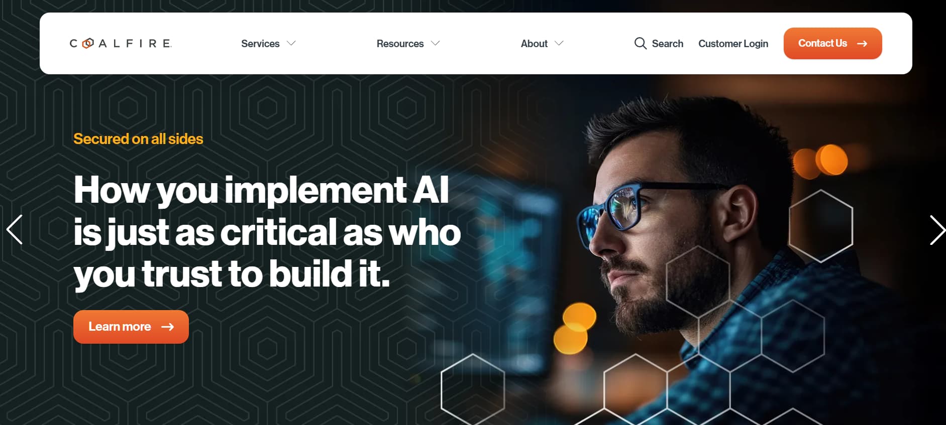 “Coalfire homepage hero showing a focused professional wearing glasses, overlaid with hexagonal patterns and the headline ‘How you implement AI is just as critical as who you trust to build it.’”