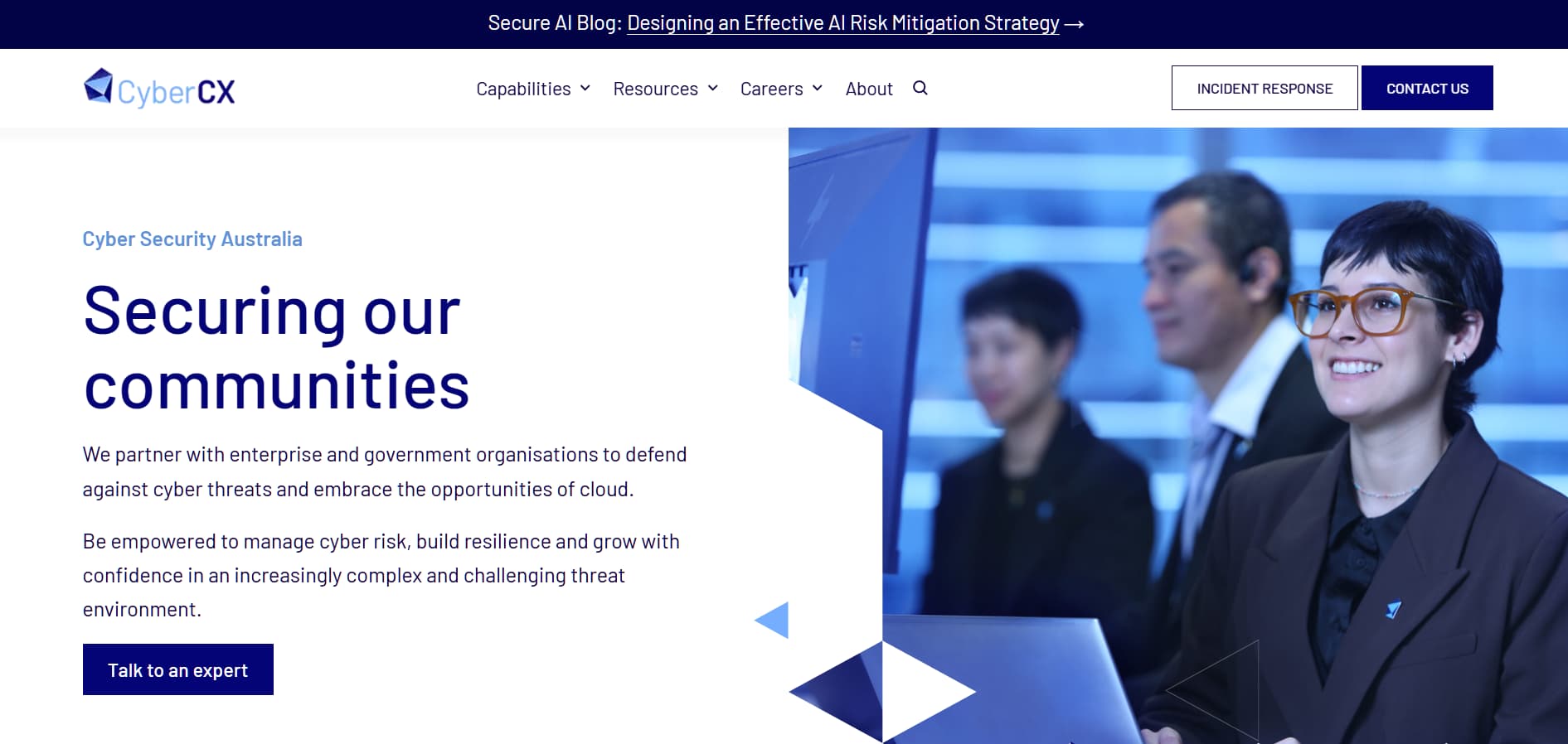 “CyberCX Australia homepage showing security professionals in an office setting with headline ‘Securing our communities’ and enterprise cybersecurity services.”